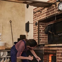 Visite d'un fournil avec four à bois à gueulard